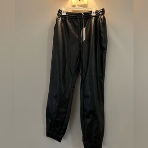 Brand new with tags!! Faux leather pants !!XS